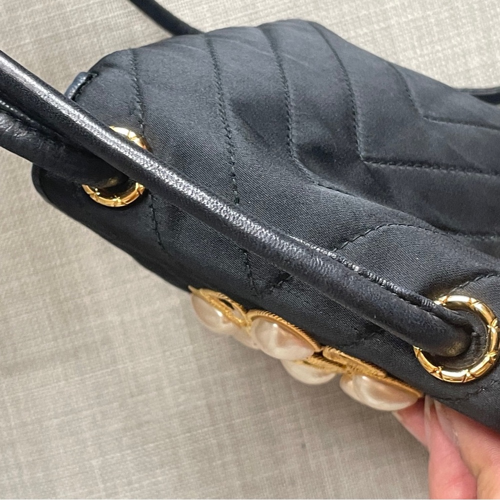 CHANEL Black Quilted Crossbody Bag with Pearl Flower Medallion - Picture 6 of 13
